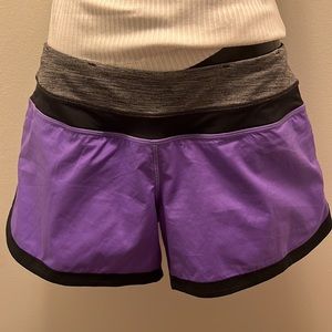 Purple Lululemon run shorts